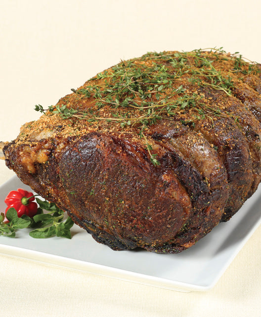 Cooked Dry-Aged USDA Prime 7-Bone Rib Roast from New York Prime Beef, tender and flavorful with rich marbling.
