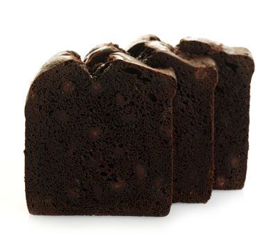 Sweet Sam’s Double Chocolate Pound Cake from New York Prime Beef, shown sliced to highlight rich chocolate texture with semi-sweet chocolate chips